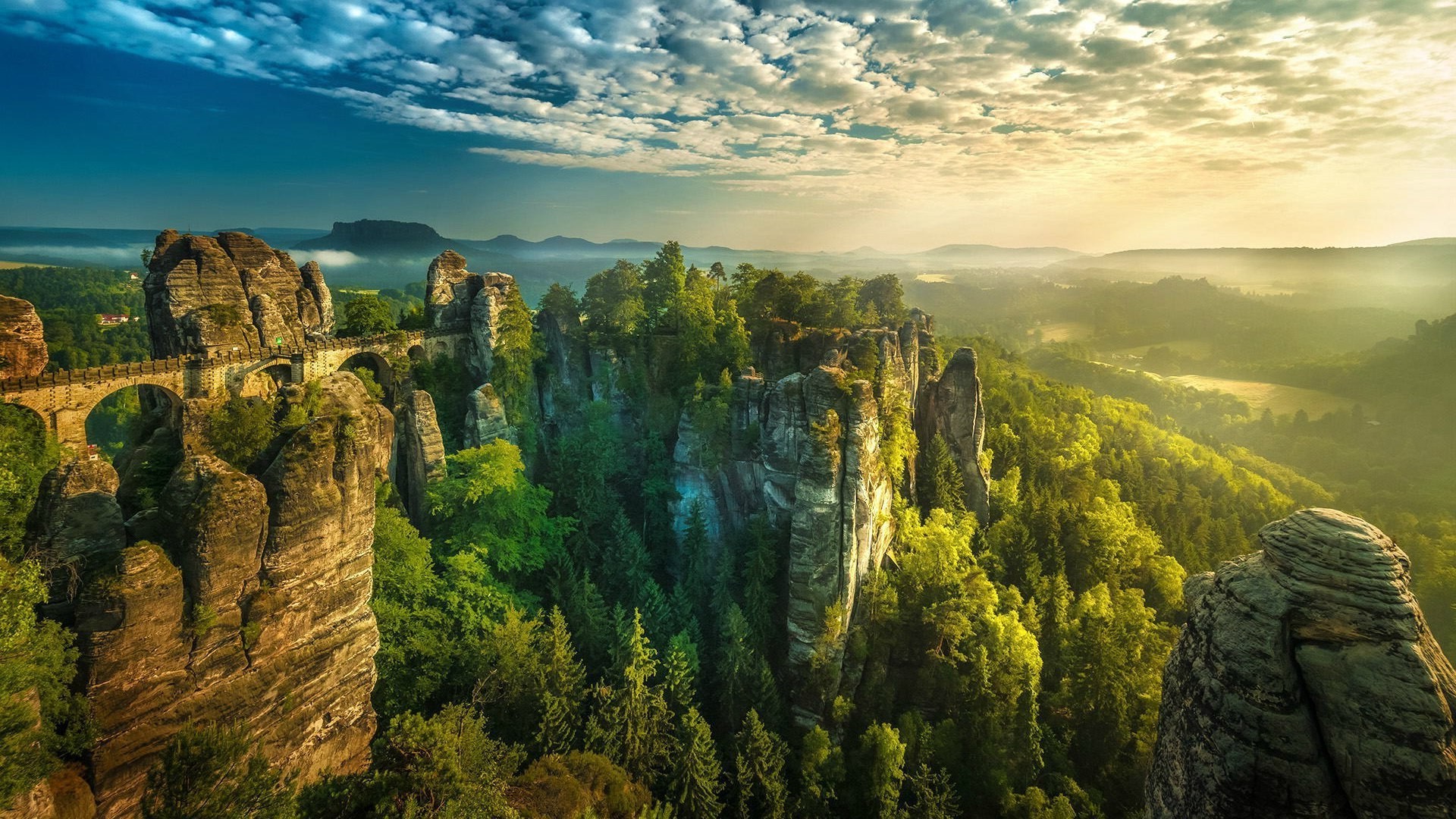 1920x1080 sunset germany saxon switzerland forest landscape clouds hill mist cliff valley bridge bastei nature climbing wallpaper JPG 629 kB