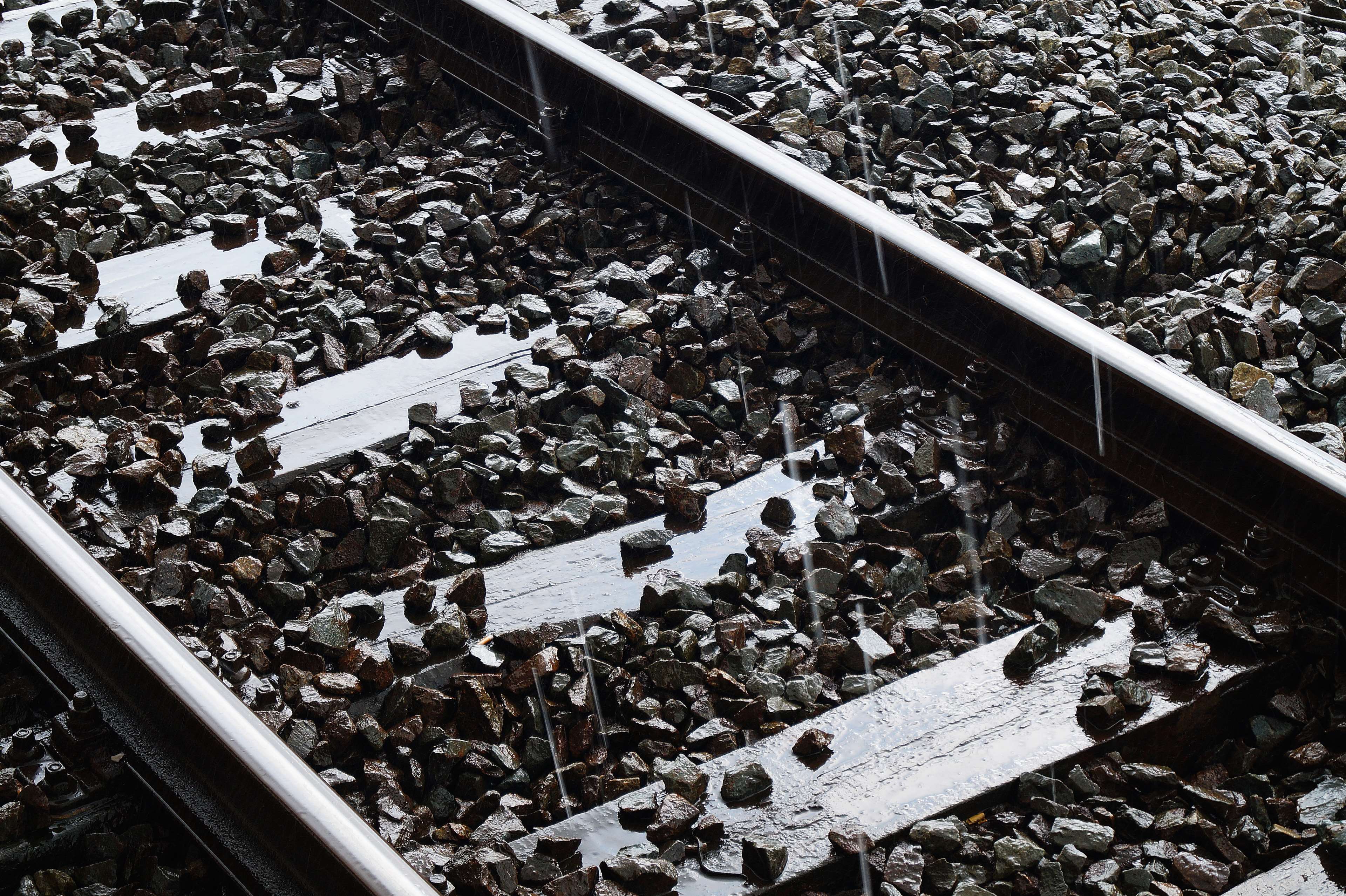 close up, gravel, iron, long exposure, outdoors, railroad, railroad track, rails, railway, railway line, railway track, railways, raindrops, steel, tracks, train tracks, woods 4k wallpaper