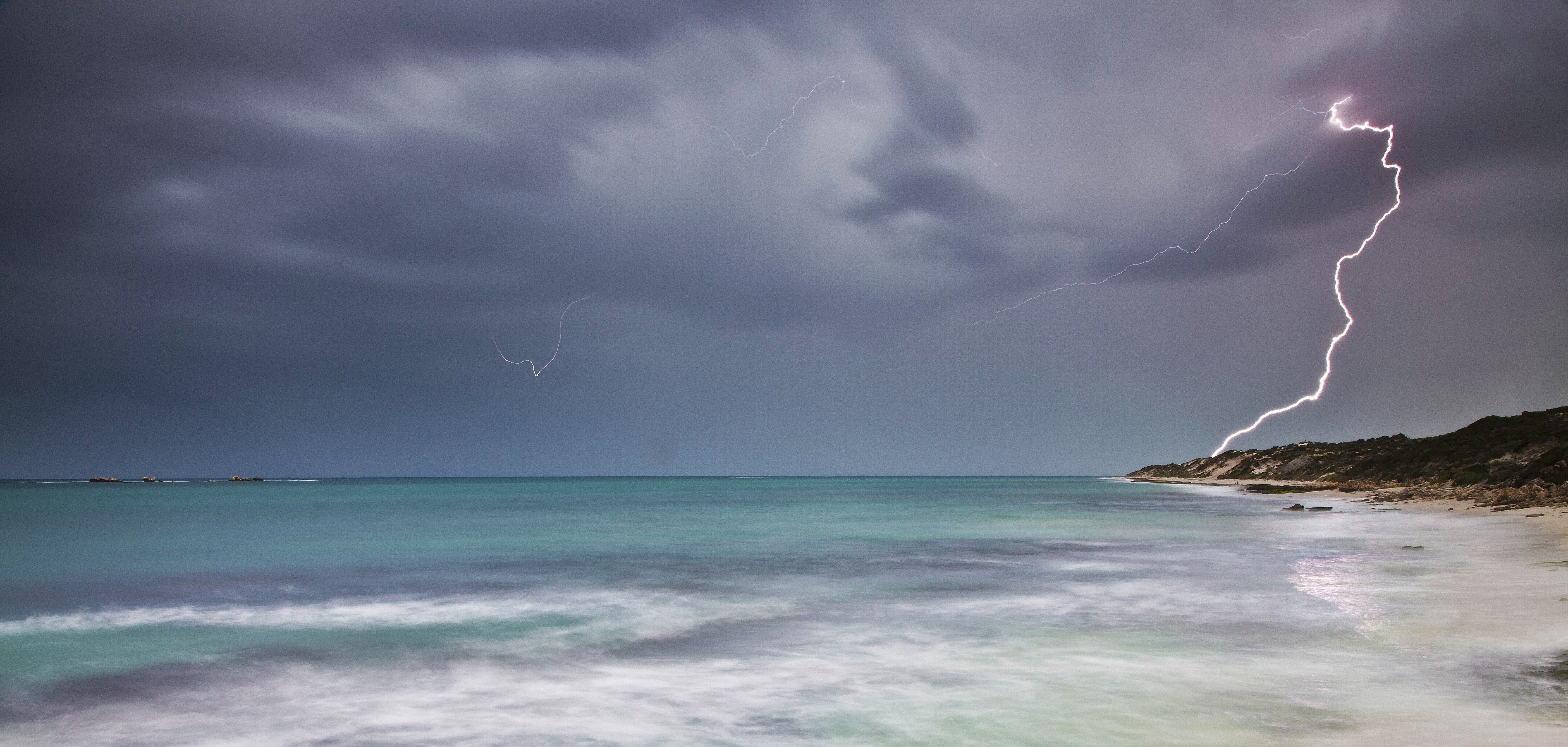 5616x2676 clouds, lightning, ocean, rain, sea, sky, storm